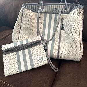 Used Neoprene washable lightweight with wristlet